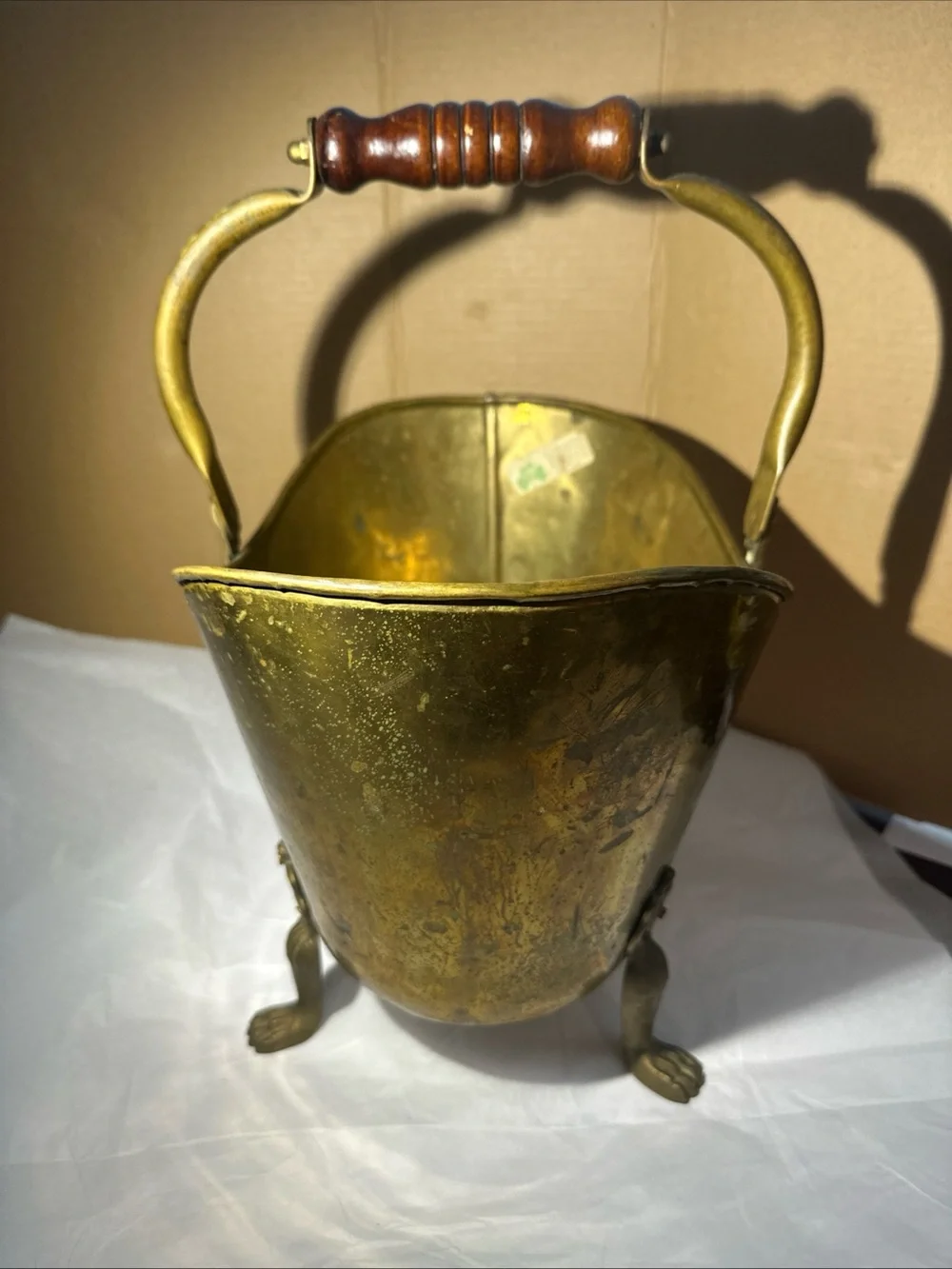 Solid copper and brass coal handle lions head footed made in Ireland 12”x13”x9”